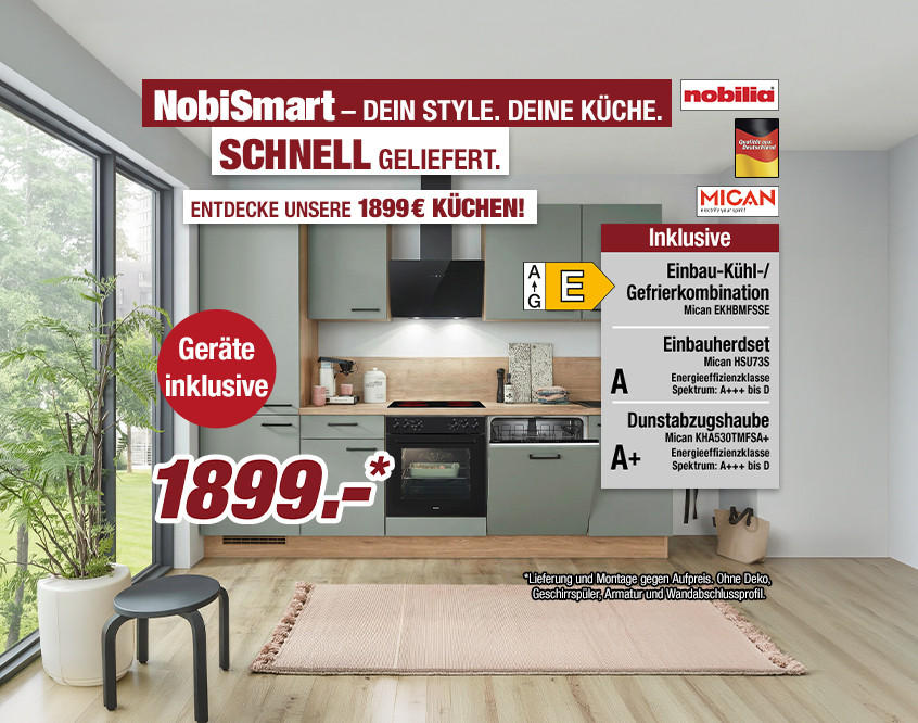 Moderner Küchenblock mit grauen Fronten, schwarzer Dunstabzugshaube, eingebauten Elektrogeräten und großem Fenster mit Blick ins Grüne